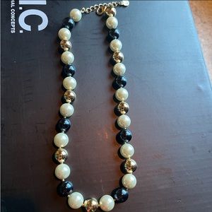 Black, gold and off white Pearl necklace. Never worn